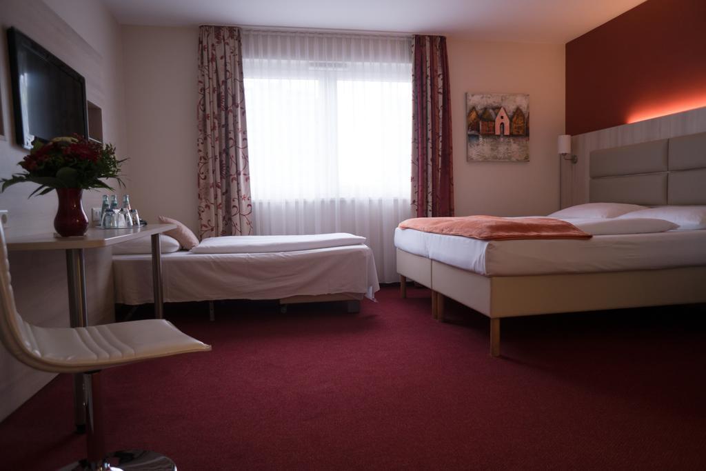 Hotel Roedelheimer Hof - Am Wasserturm Frankfurt pe Main Cameră foto
