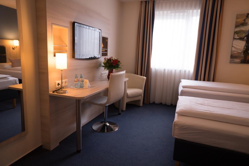 Hotel Roedelheimer Hof - Am Wasserturm Frankfurt pe Main Cameră foto
