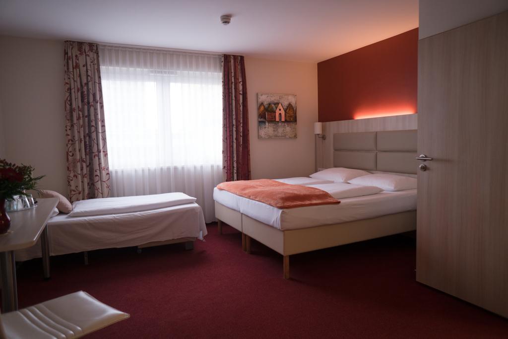 Hotel Roedelheimer Hof - Am Wasserturm Frankfurt pe Main Cameră foto