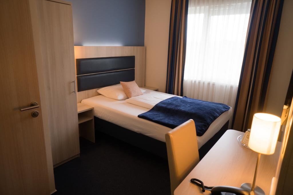 Hotel Roedelheimer Hof - Am Wasserturm Frankfurt pe Main Cameră foto